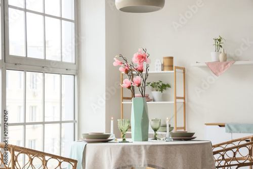 Vase with artificial magnol...