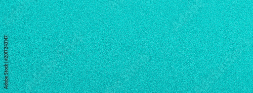 Сloud green textured paper background with subtle grain and speckle pattern f...