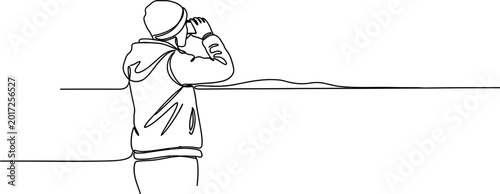 Tableau sur toile Minimalist line drawing of person wearing beanie and hoodie holding a cup, looki