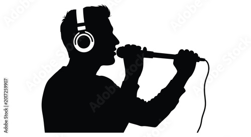 Foto Singer with microphone and headphones black silhouette