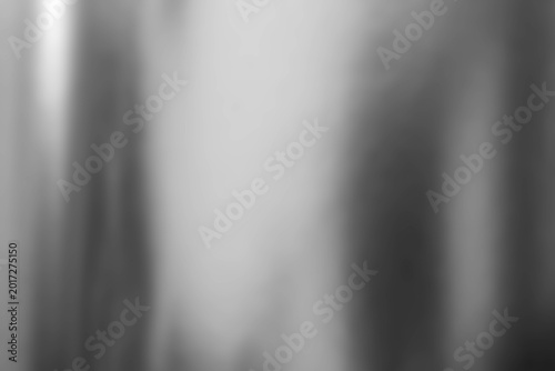 Abstract blurred grayscale background with soft vertical gradients and moody ...
