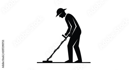Bilde på lerret Metal detecting silhouette man with detector searching for treasure on beach or