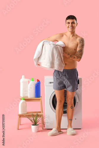 Young man in underpants wit...