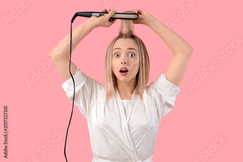 Shocked young blonde woman ...