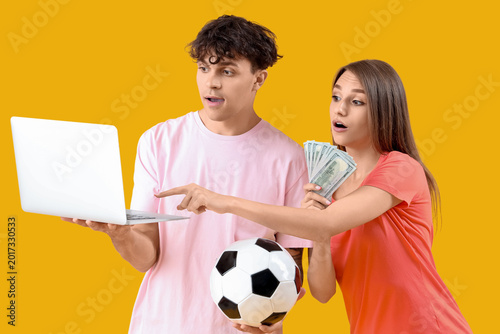 Shocked young couple with l...