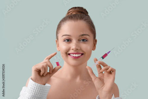 Beautiful young woman with ...