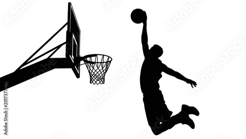Cuadro en lienzo Athletic player dunking basketball on a hoop with dynamic pose