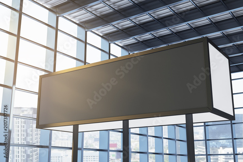 Blank rectangular airport advertising box mockup suspended in modern glass bu...