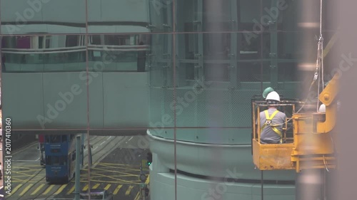 Teamwork in Action: Repairing a Glass Wall in Hong Kong