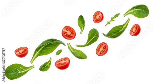 Fresh basil leaves and cherry tomatoes.