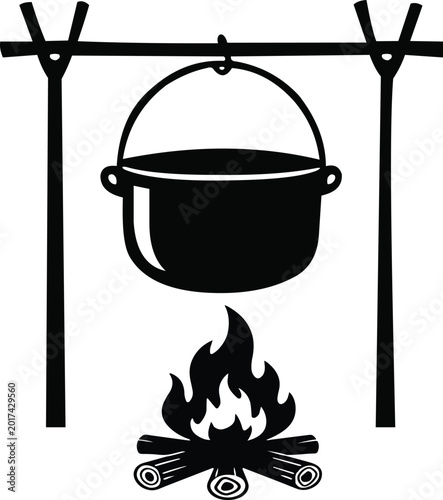 Traditional campfire cooking pot hanging on tripod, outdoor meal preparation for camping, hiking, and forest adventure.