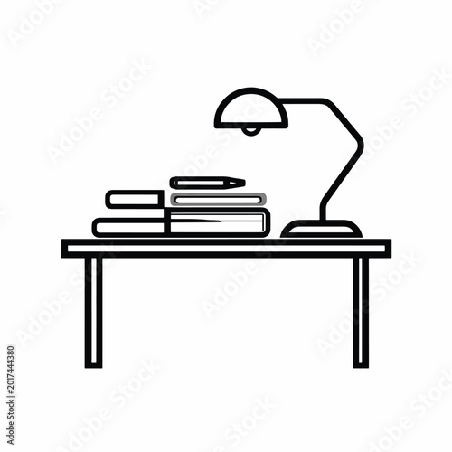 Desk lamp on a table.