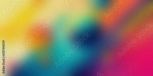 Fotografie Vibrant abstract multi color gradient background featuring soft blurred light spots with rich film grain texture pattern