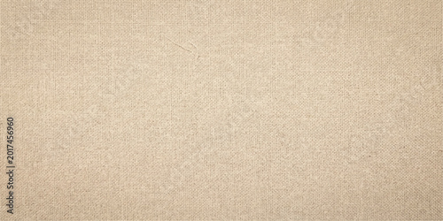 Bild auf Leinwand A rough and aged brown cardboard texture background with a vintage beige paper p