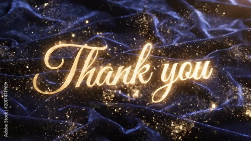 Elegant golden Thank you text illuminating on dark blue velvet fabric with shimmering particles, perfect for Memorial Day tributes, luxury branding, and veteran appreciation.