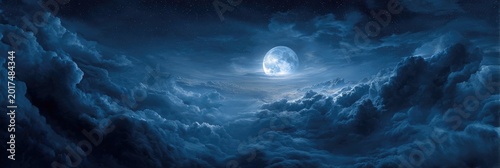 Full moon illuminates a cloudy, celestial night sky