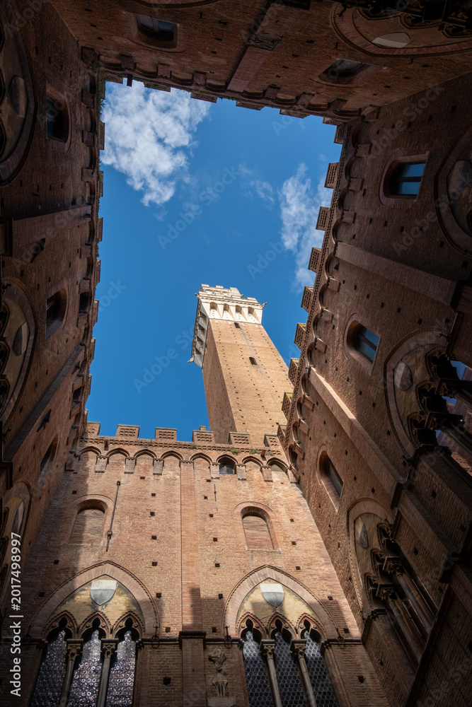 Fototapeta premium View of Palazzo Pubblico bell tower, Siena, Italy