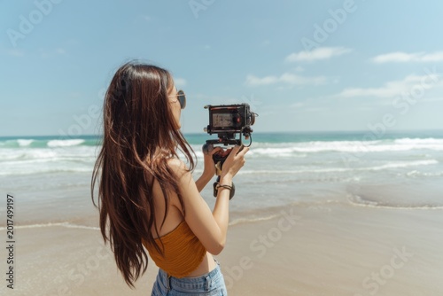 Content Creator Shooting Beach Reels Outdoors