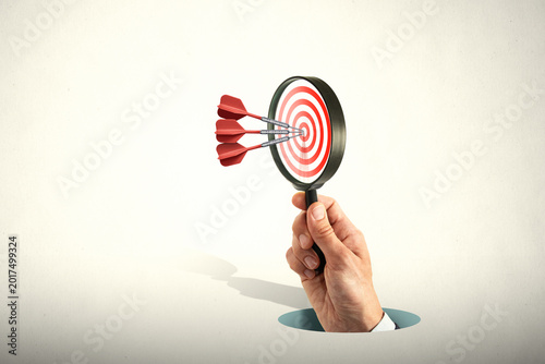 Three darts hit the target. The concept of business success.
