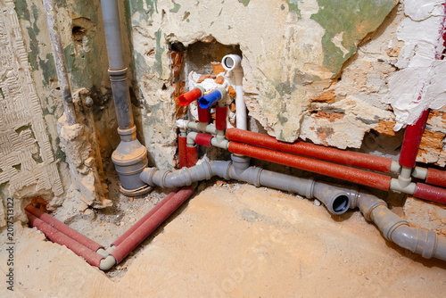 Quadro su tela Installation of new plumbing, new water and sewer pipes.