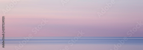 Blurred background sea and sky at sunrise.