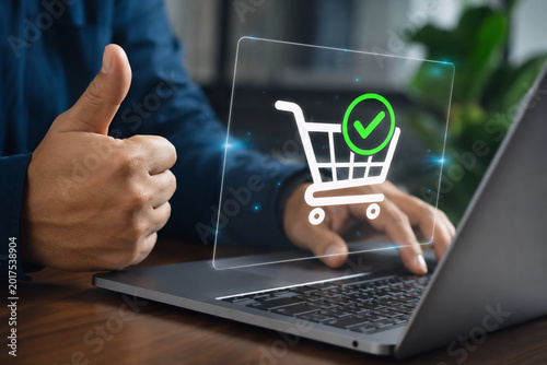 Картината върху платно Person satisfied with internet purchase - online shopping, showing thumbs up beh