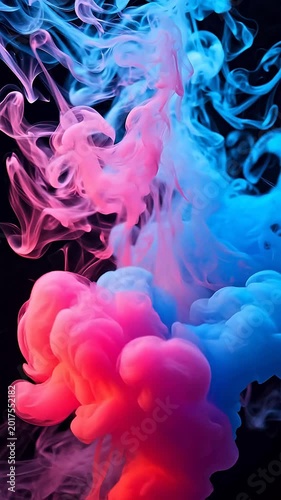 Pink and blue smoke drifting in black