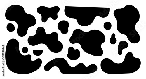 Tableau sur toile Abstract black cow spots or inkblots on a white background.