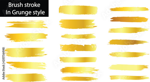 Vászonkép Golden grunge brush strokes on white background for design elements