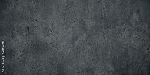 A dark aged grey metal and concrete wall texture with a dirty vintage grunge surface creates a rough patterned material backdrop for a blank textured industrial design