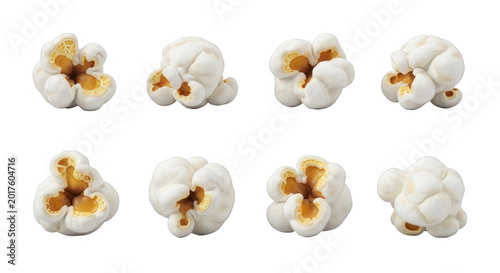 close-up of eight pieces of freshly popped popcorn isolated on a white background snack ads