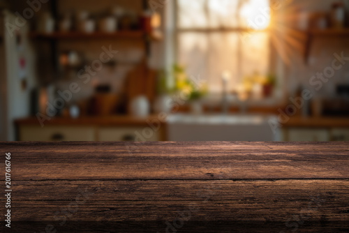 Photos A beautiful kitchen window filled with morning light and a wooden countertop in