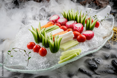 Fotografie Fresh vegetables served in ice platters