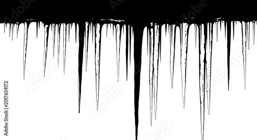 Cuadro en lienzo Black paint drips down on white background creating abstract streaks and texture
