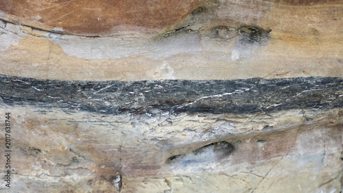 Bilde på lerret Rough eroded sandstone surface showing natural layered rock formation with varie