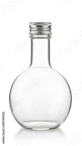 Empty glass bottle with metal cap on white background isolated on white background