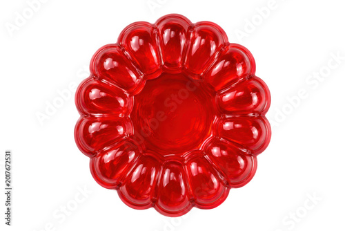 Fotografía Glossy red gelatin dessert mold isolated on light gray background, top view with