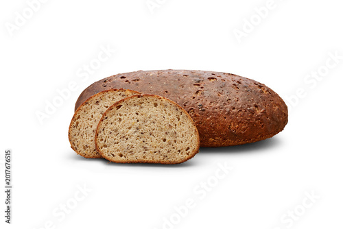 Foto Whole grain bread loaf with two rustic slices