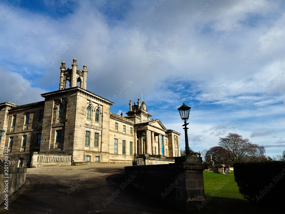 Obraz premium Historic neoclassical Modern Two building in Edinburgh, Scotland, UK framed by dramatic sky, vintage lamppost and landscaped lawns near city park
