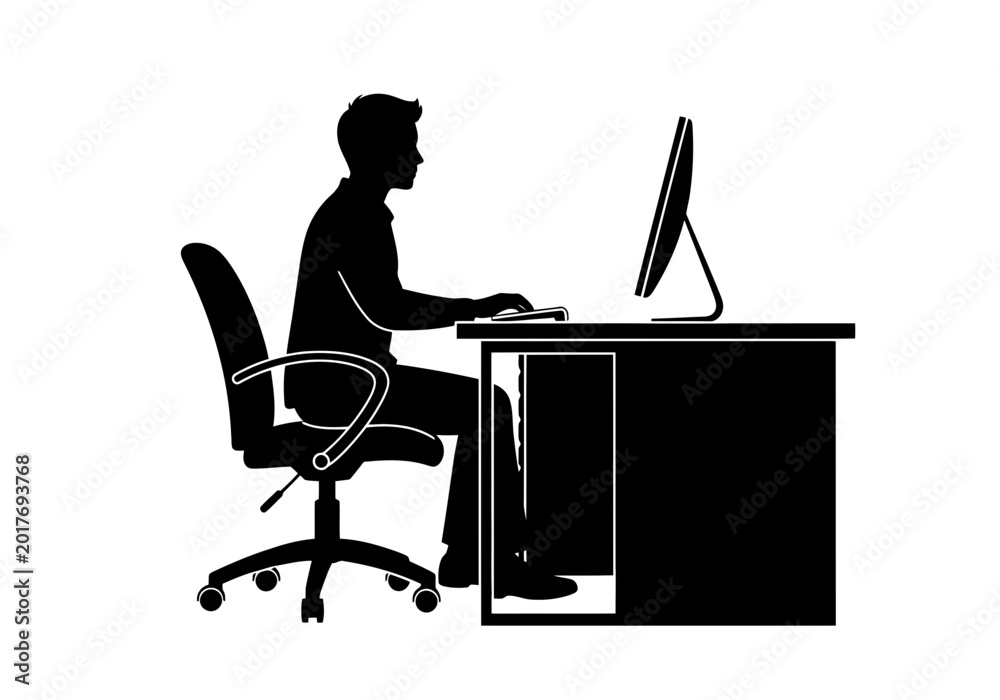 Fototapeta premium Silhouette of a man working on a computer at a desk