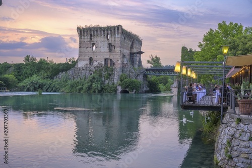Restaurant on the Mincio River and Visconti Bridge dating back to 1395, Borghetto, Valeggio sul Mincio, Province of Verona, Italy