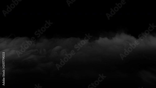 Realistic ground fog or smoke effect moving slowly across a black background.