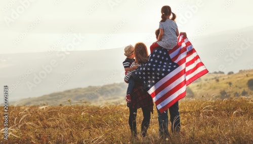 Family celebrates 250th usa independence day, proudly displaying the american flag in a warm, golden field.