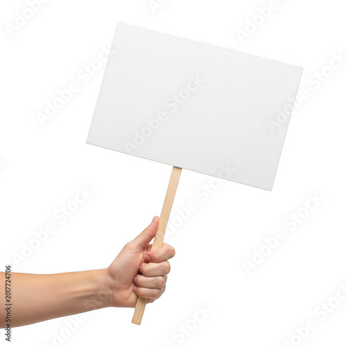 A person holding an empty white blank sign on a wooden stick
