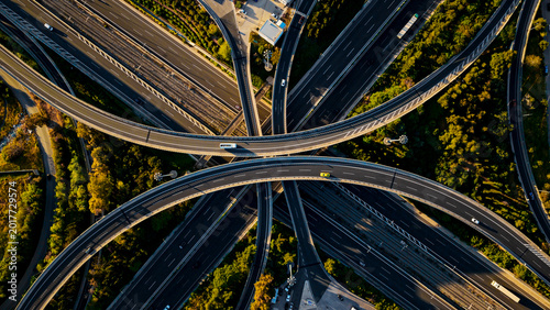 Canvas Print Aerial view capturing a complex motorway interchange, showing numerous roads and