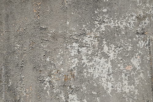 Old painted wall with peeling cracked paint and rough weathered texture. Distressed abstract background for overlays, banners and urban design.