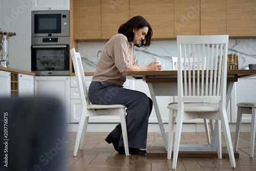 Woman Experiencing Emotional Fatigue at Home