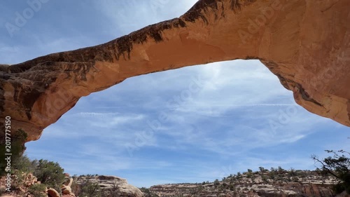 Hiking in Natural Bridges near Blanding, Utah, sandstone arches, cliff dwellings and desert landscape