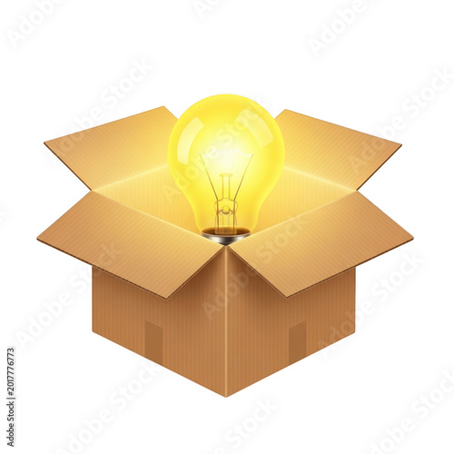 A cardboard gift box with a glowing light emerging from inside