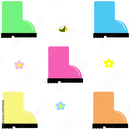 Colorful and funny rubber children s boots with flowers and a bee.